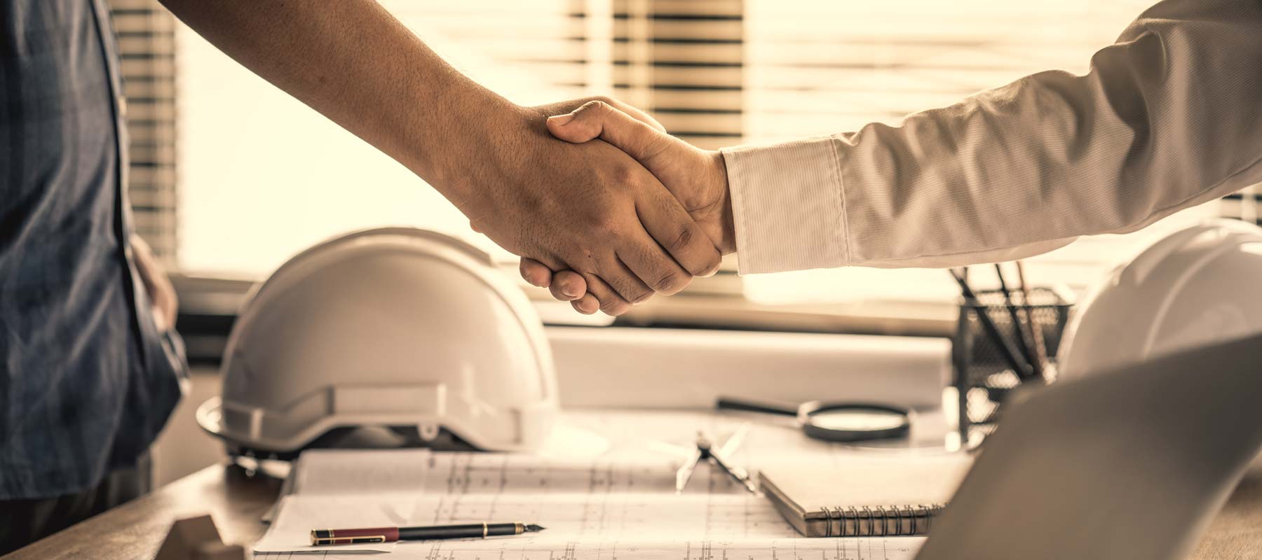 building consultants shaking hands